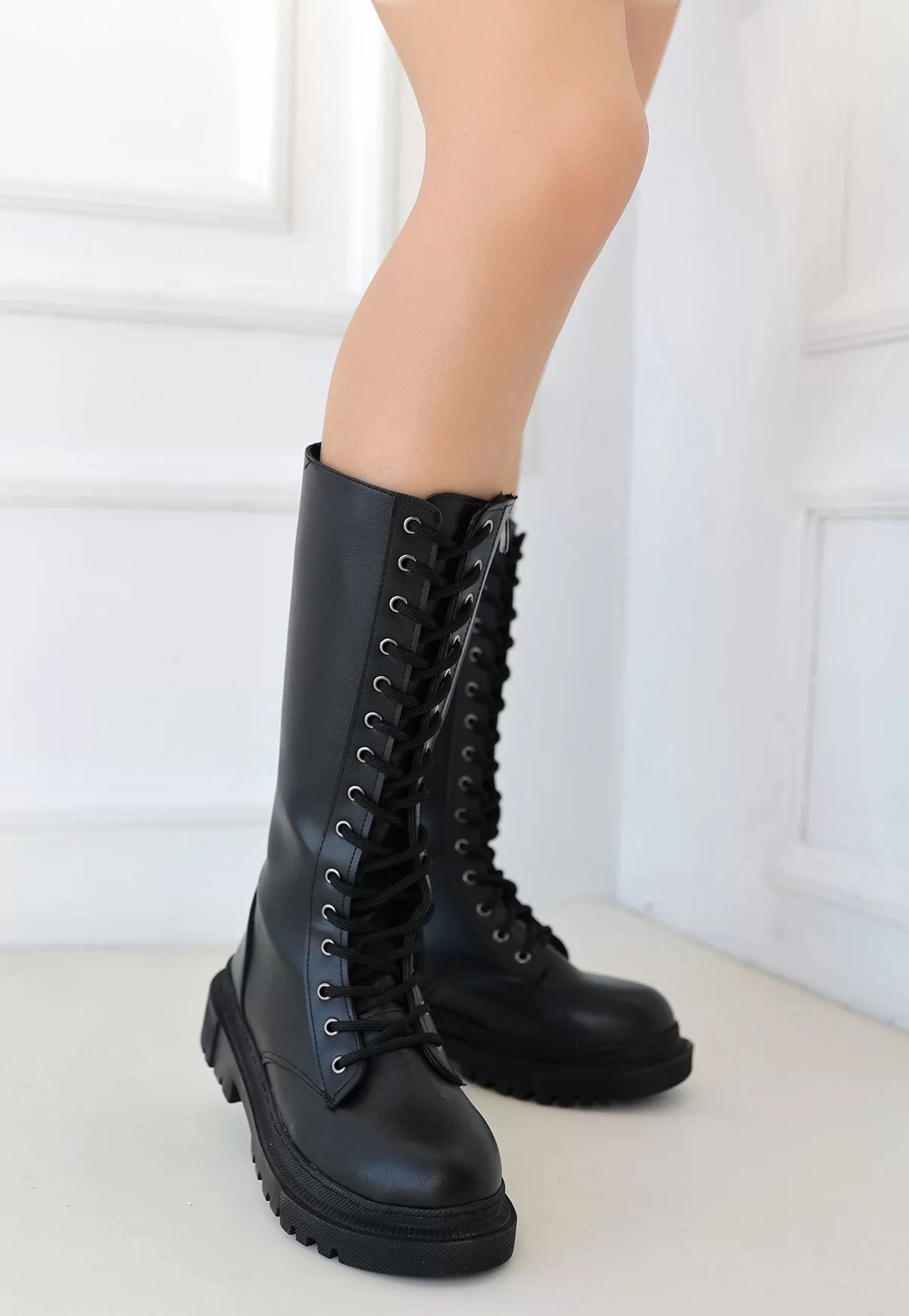 Uliza Black Skin Lace-up Boots