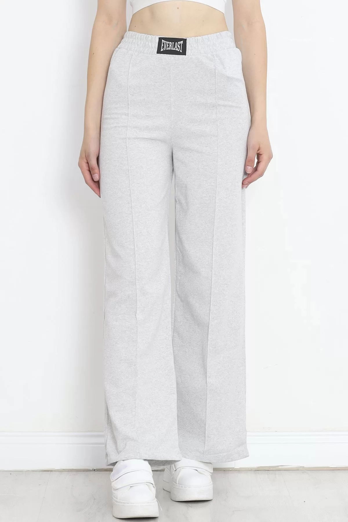 Tracksuit pants with crest in gray - 16688.1005.