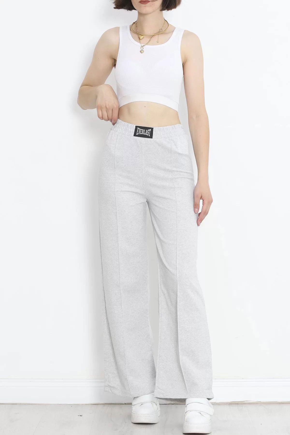 Tracksuit pants with crest in gray - 16688.1005.