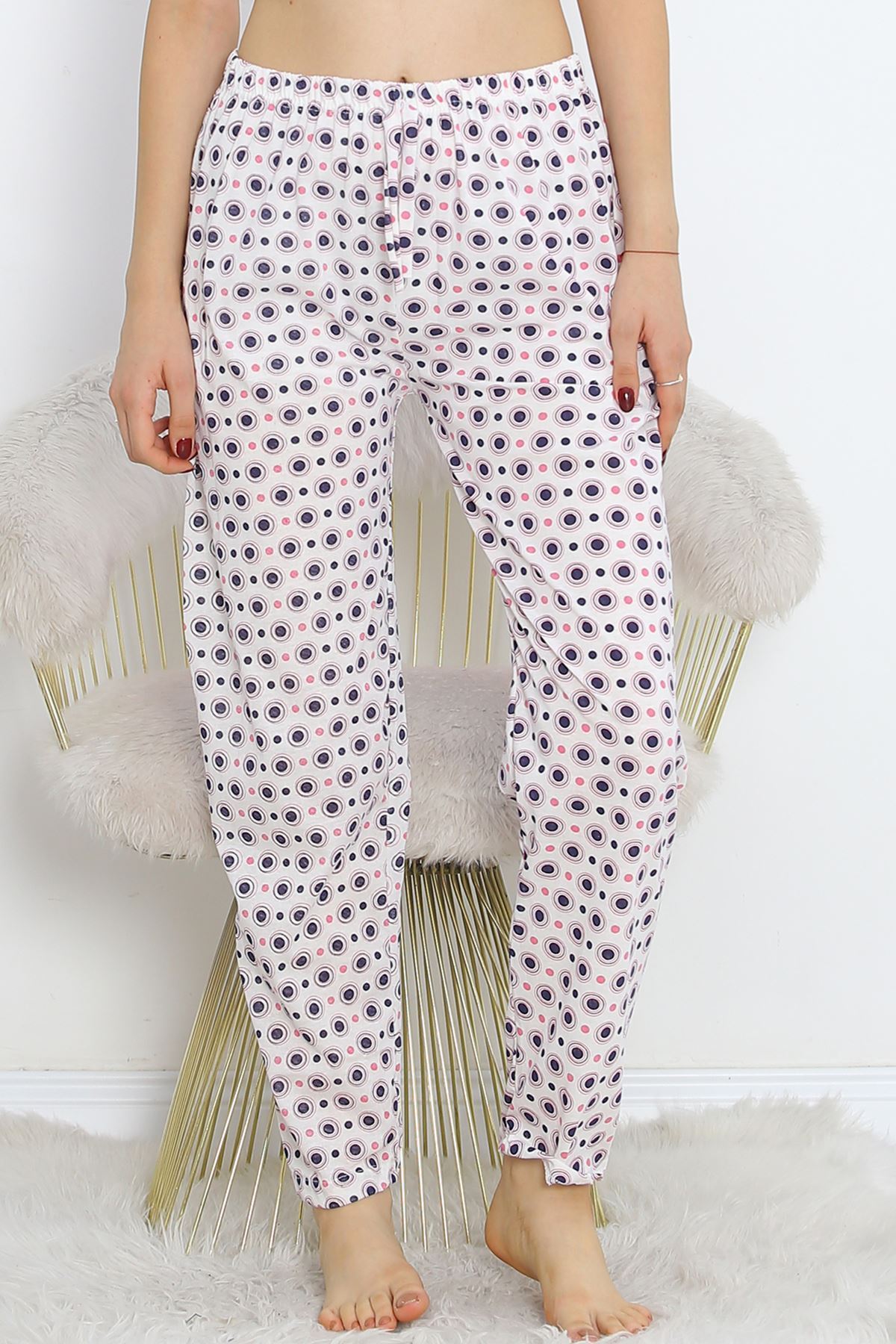 Pajama bottoms with white polka dots