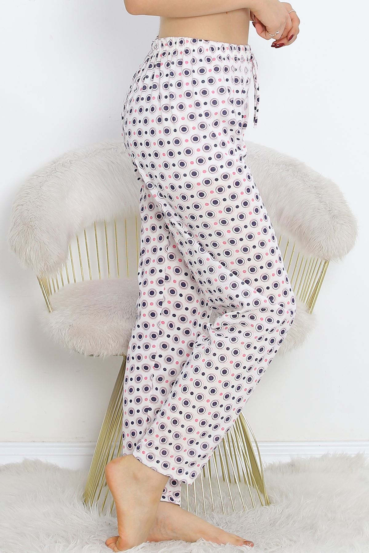 Pajama bottoms with white polka dots